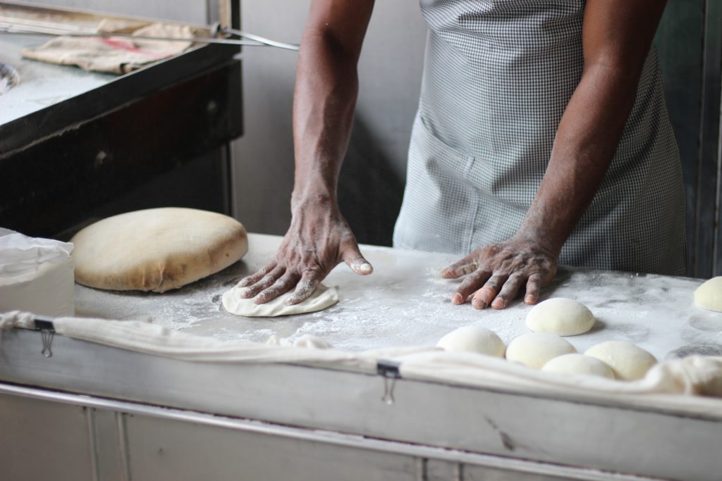 man preparing dough for bread 3218467